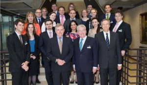 Group photo on marble stairs with Richard Ward, CEO of Lloyd’s